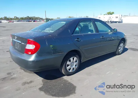 2003 Toyota Camry Le from USA, damaged, VIN 4T1BE32KX3U713054